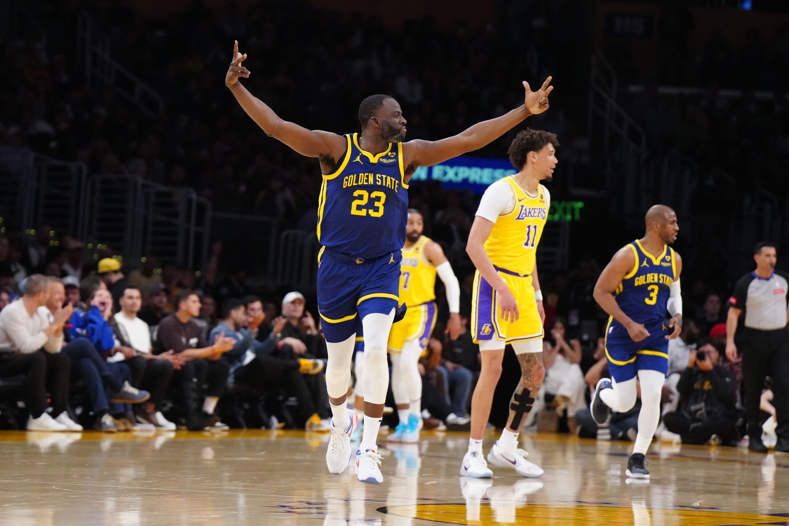 Apr 9, 2024; Los Angeles, California, USA; Golden State Warriors forward Draymond Green (23) celebrates in the first half against the Los Angeles Lakers at Crypto.com Arena. Mandatory Credit: Kirby Lee-USA TODAY Sports
