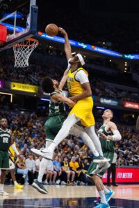 Apr 28, 2024; Indianapolis, Indiana, USA; Indiana Pacers center Myles Turner (33) shoots the ball while Milwaukee Bucks guard Andre Jackson Jr. (44) defends during game four of the first round for the 2024 NBA playoffs at Gainbridge Fieldhouse. Mandatory Credit: Trevor Ruszkowski-USA TODAY Sports