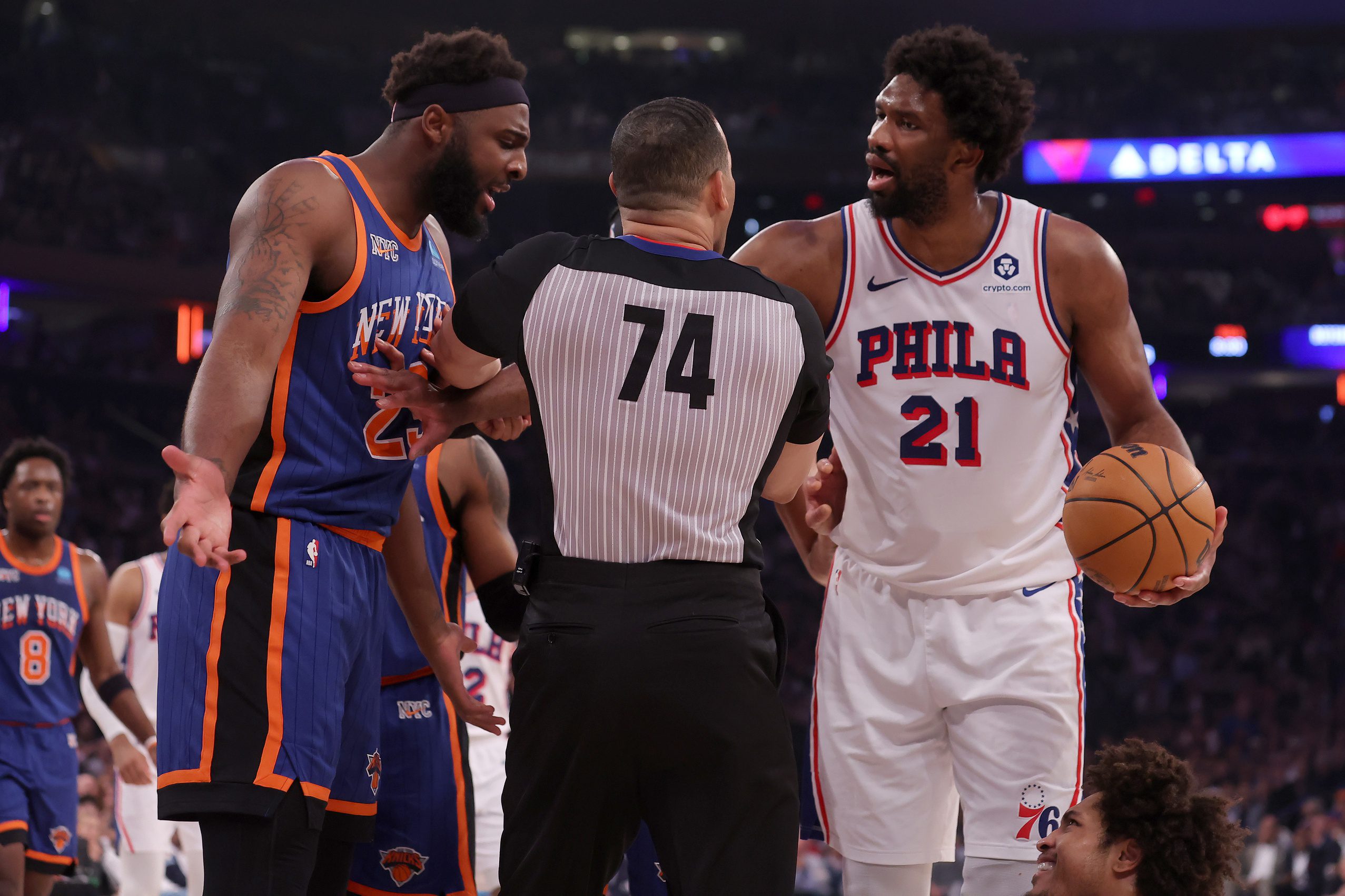 Philadelphia 76ers' Joel Embiid Finds Surprising Ally in ESPN Host Amid 3-Game Suspension: "Marcus Hayes' Column Crosses the Line" 3 Apr 30, 2024; New York, New York, USA; New York Knicks center Mitchell Robinson (23) has words with Philadelphia 76ers center Joel Embiid (21) and guard Kelly Oubre Jr. (9) after fouling Oubre during the first quarter of game 5 of the first round of the 2024 NBA playoffs at Madison Square Garden. Mandatory Credit: Brad Penner-USA TODAY Sports