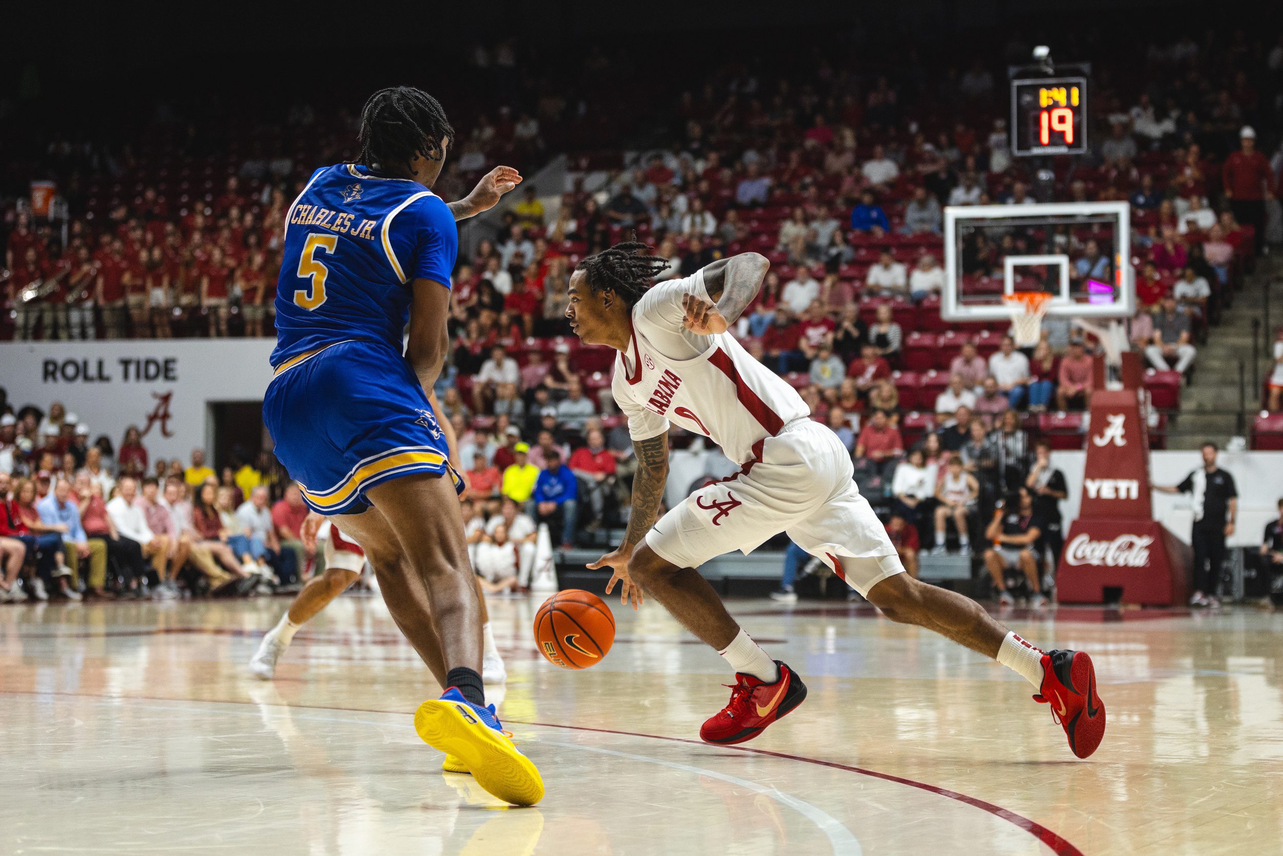 Alabama Crimson Tide's Top Freshman Prospects Shares 1 Honest Thought About NBA Future 2 Nov 11, 2024; Tuscaloosa, Alabama, USA; Alabama Crimson Tide guard Labaron Philon (0) drives the ball against McNeese State Cowboys forward Joe Charles Jr. (5) during the second half at Coleman Coliseum. Mandatory Credit: Will McLelland-Imagn Images
