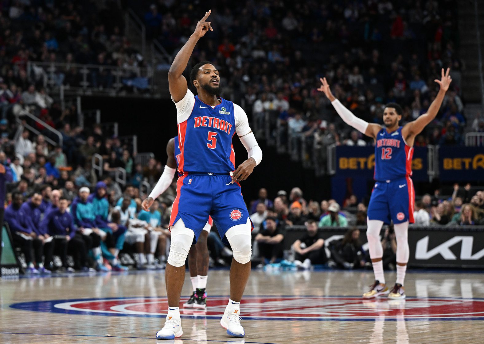 Feb 9, 2025; Detroit, Michigan, USA; Detroit Pistons guard Malik Beasley (5) celebrates after making a three-point shot against the Charlotte Hornets in the first quarter at Little Caesars Arena. Mandatory Credit: Lon Horwedel-Imagn Images