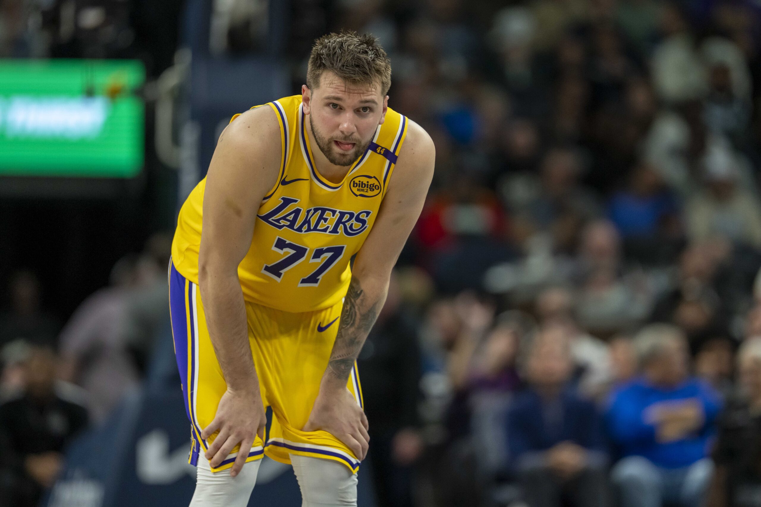 Los Angeles Lakers guard Luka Doncic (77) looks on against the Minnesota Timberwolves in the first half during game three of first round for the 2024 NBA Playoffs at Target Center.