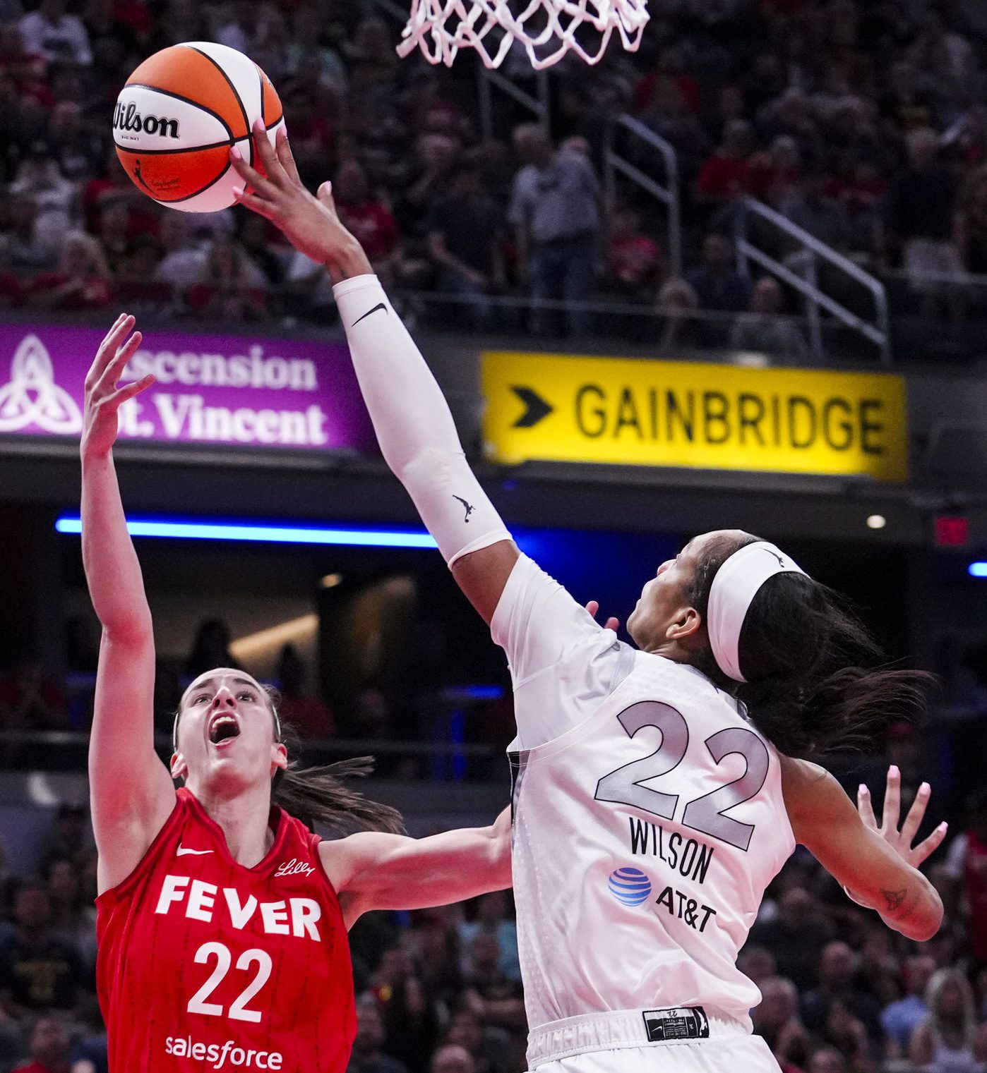 "Sometimes You Need Proof In The Pudding": Caitlin Clark Draws Brutal A’ja Wilson Jab After Injury-Plagued Season Triggers Harsh Viewership Reality Check 3 Las Vegas Aces center A'ja Wilson (22) blocks Indiana Fever guard Caitlin Clark (22) on Wednesday, Sept. 11, 2024, during a game between the Indiana Fever and the Las Vegas Aces at Gainbridge Fieldhouse in Indianapolis. The Aces defeated the Fever, 86-75.