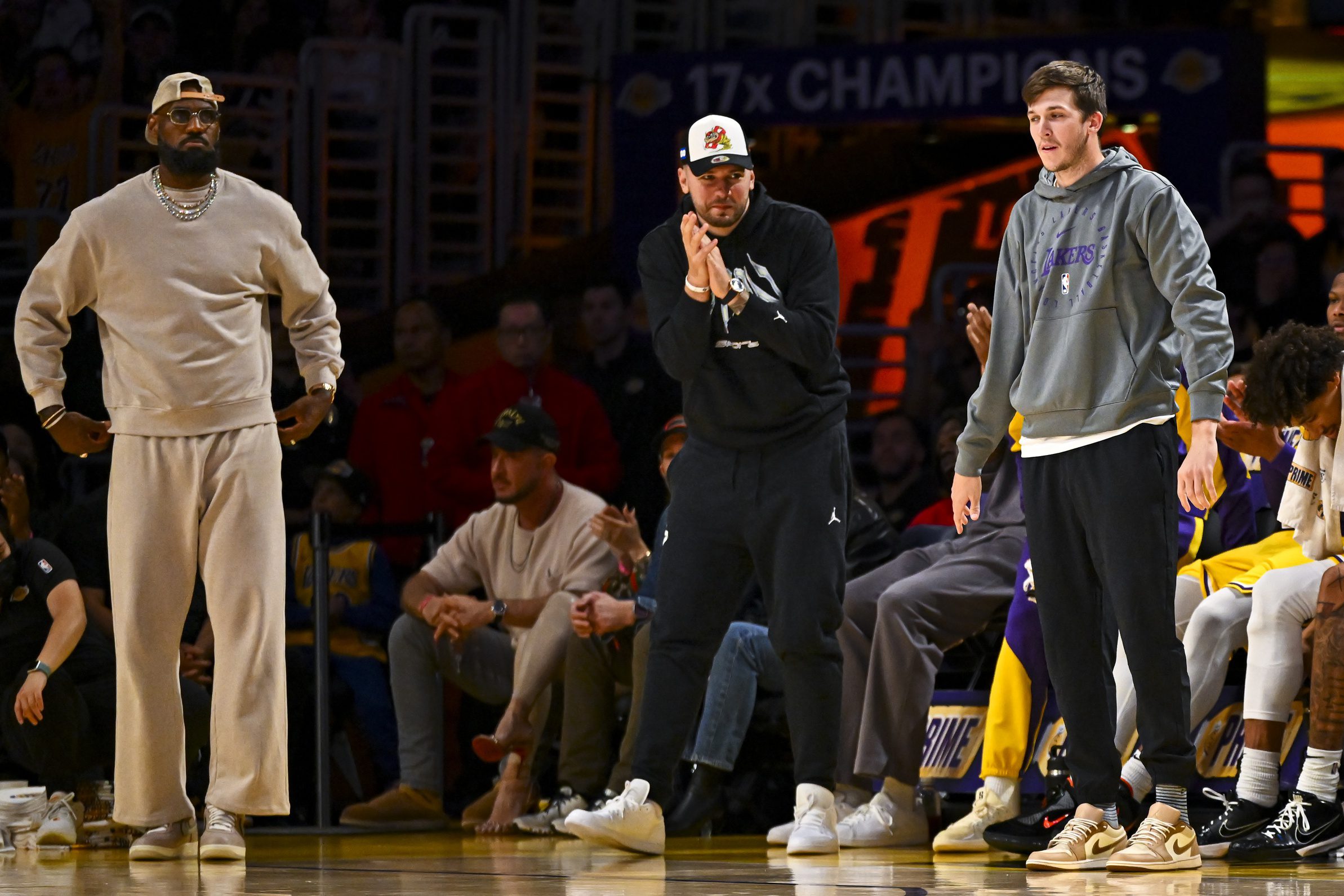 Austin Reaves, LeBron James, Luka Doncic