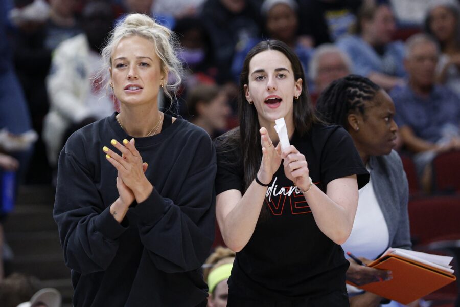 “They Can Do Whatever They Want”: Sophie Cunningham Highlights Caitlin Clark’s Freedom To Direct Fever Plays Injured Indiana Fever guard Sophie Cunningham (8) and guard Caitlin Clark (22) react from the bench during the first half of a WNBA game