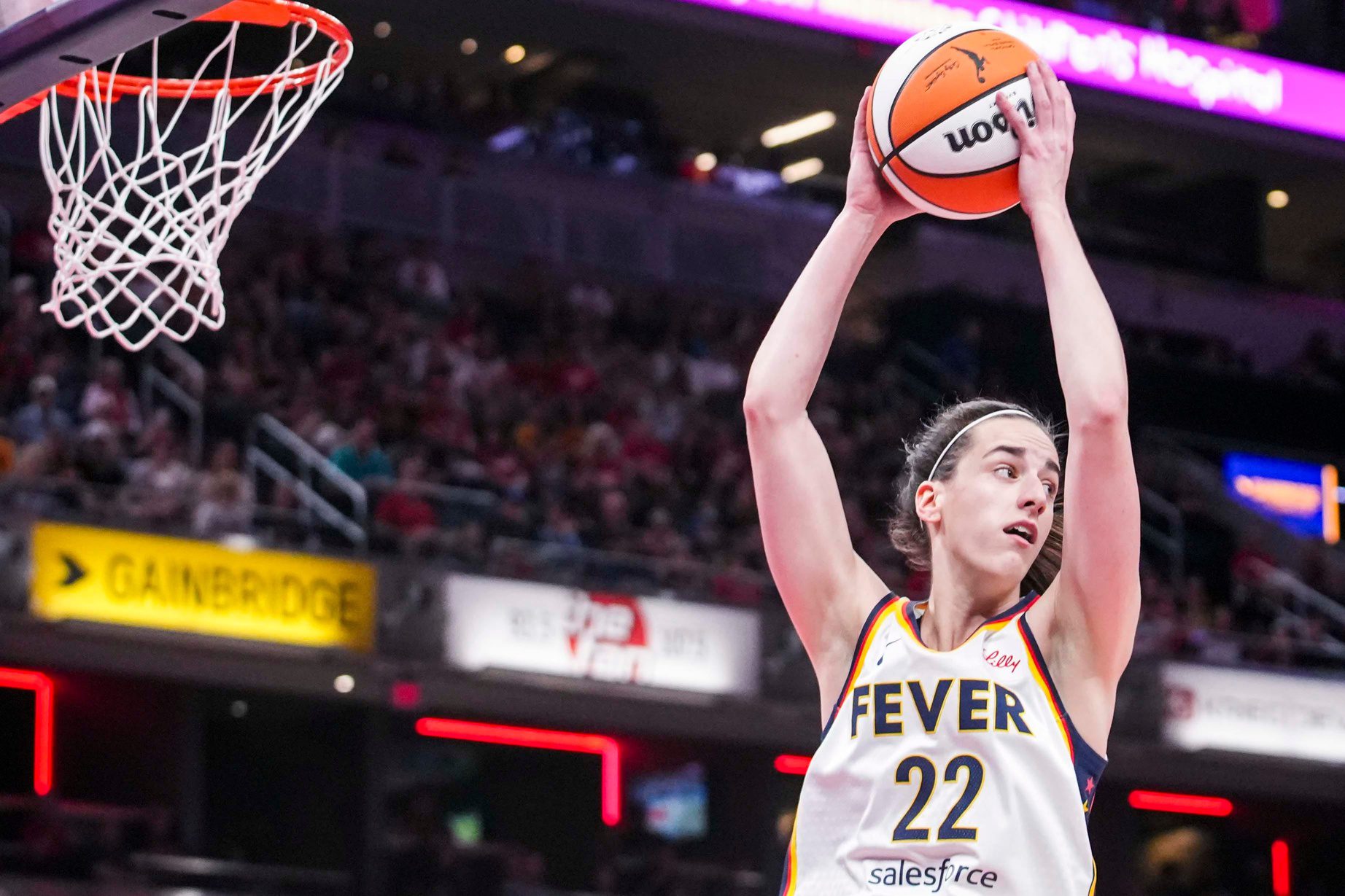 Indiana Fever guard Caitlin Clark (22) rebounds the ball Wednesday, July 9, 2025, during a game between the Indiana Fever and the Golden State Valkyries at Gainbridge Fieldhouse in Indianapolis. The Golden State Valkyries defeated the Indiana Fever, 80-61. © Grace Smith/IndyStar / USA TODAY NETWORK via Imagn Images