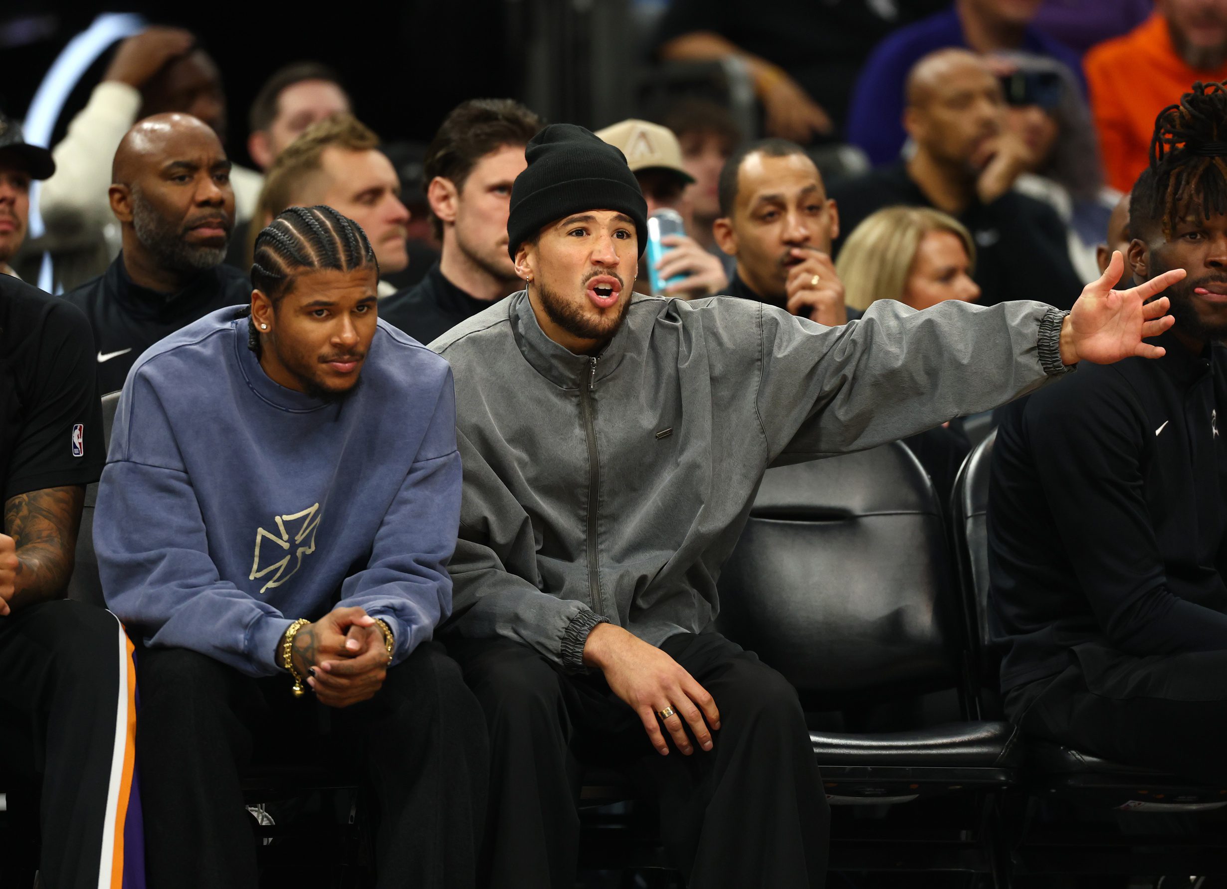 "Come Rub It": Phoenix Suns Star Devin Booker Taunts Ex-Girlfriend Kendall Jenner in Steamy Super Bowl Spat 1 Jan 29, 2026; Phoenix, Arizona, USA; Phoenix Suns injured guard Jalen Green (left) and Devin Booker on the bench against the Detroit Pistons in the first half at Mortgage Matchup Center. Mandatory Credit: Mark J. Rebilas-Imagn Images