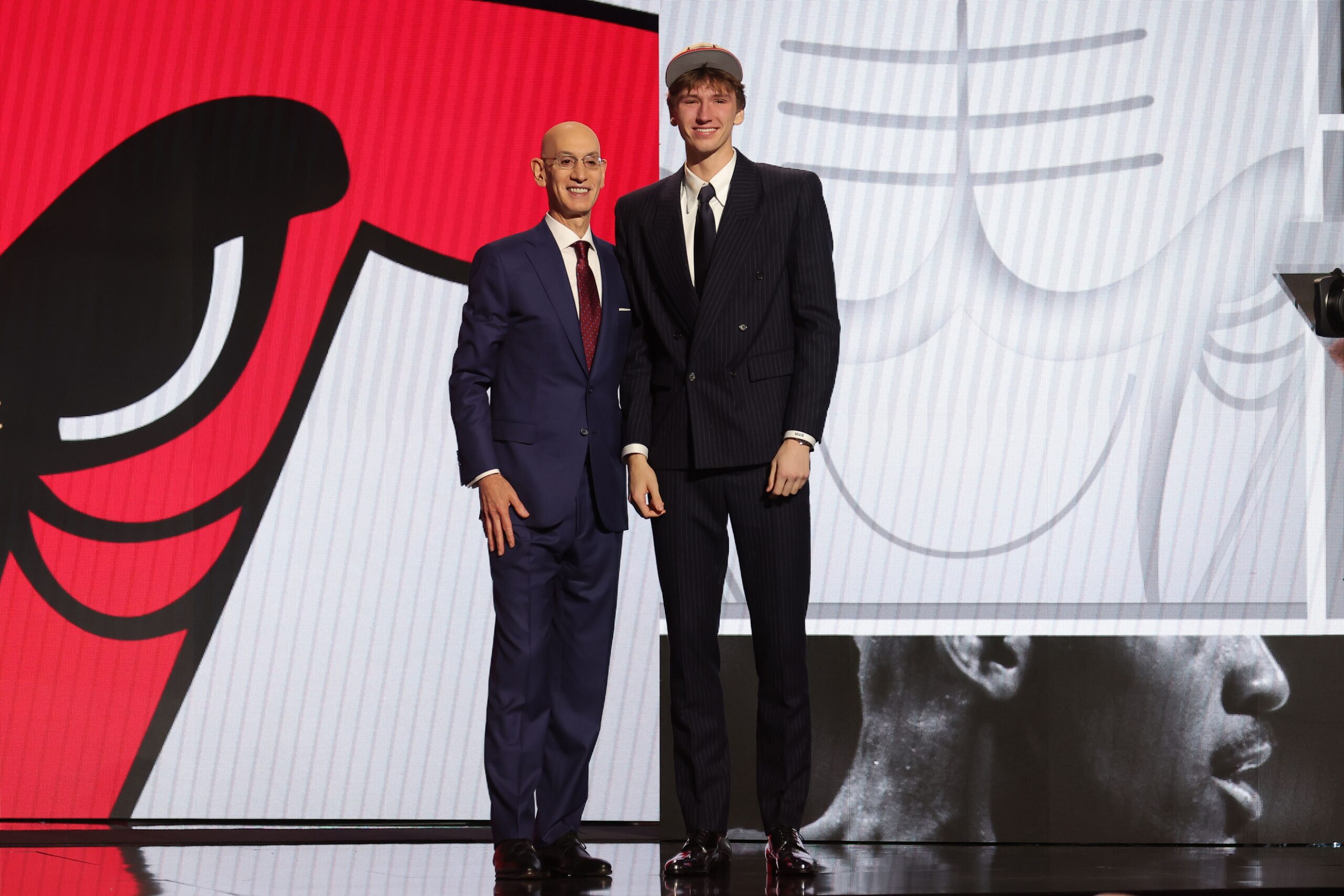 Jun 26, 2024; Brooklyn, NY, USA; Matas Buzelis poses for photos with NBA commissioner Adam Silver after being selected in the first round by the Chicago Bulls in the 2024 NBA Draft at Barclays Center. Mandatory Credit: Brad Penner-USA TODAY Sports
