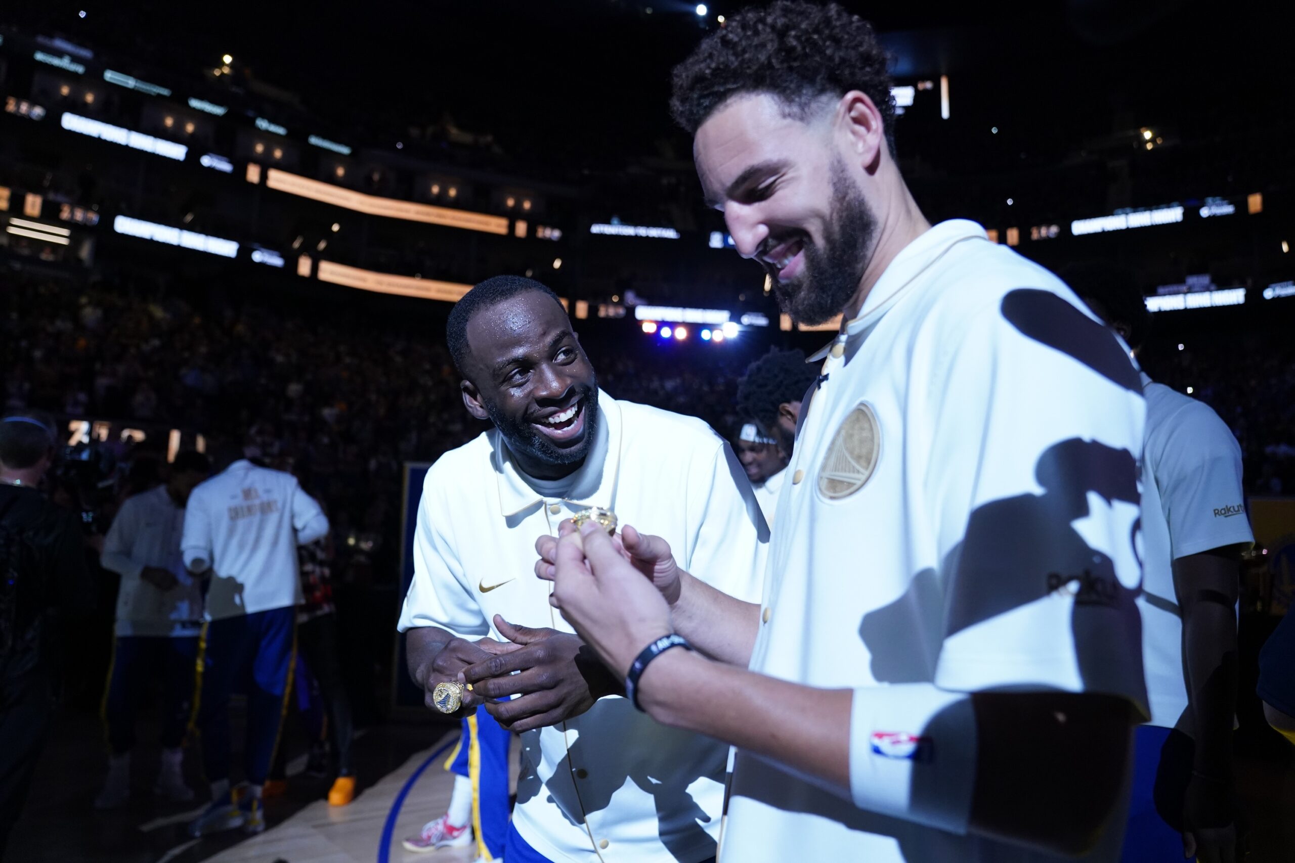 October 18, 2022; San Francisco, California, USA; Golden State Warriors forward Draymond Green (23) and guard Klay Thompson (11) receive their championship ring before the game against the Los Angeles Lakers at Chase Center. Mandatory Credit: Kyle Terada-USA TODAY Sports