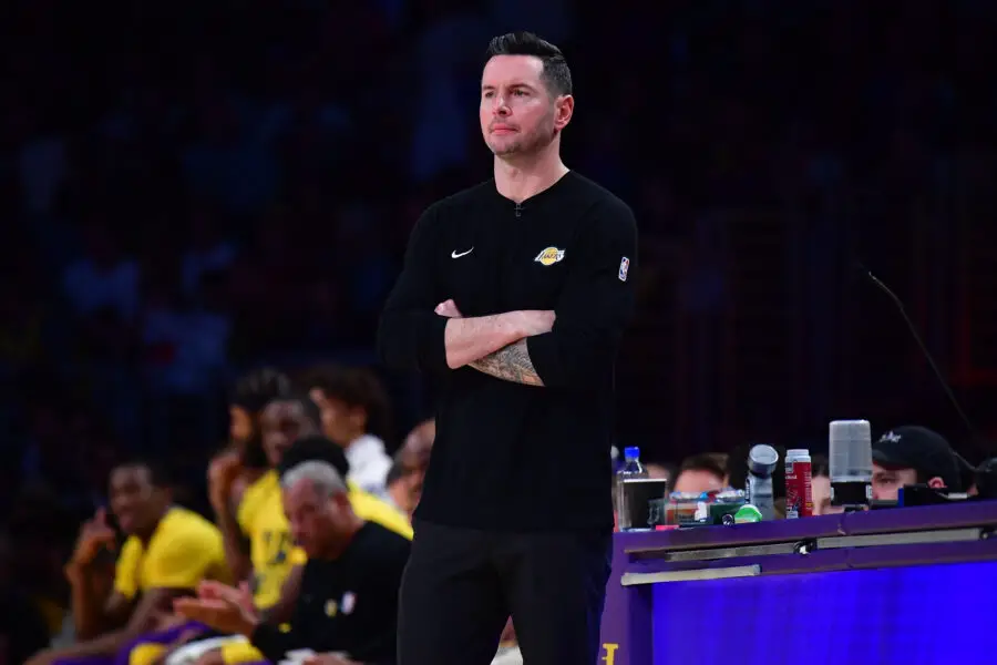 Feb 6, 2025; Los Angeles, California, USA; Los Angeles Lakers head coach JJ Redick watches game action against the Golden State Warriors during the second half at Crypto.com Arena. Mandatory Credit: Gary A. Vasquez-Imagn Images