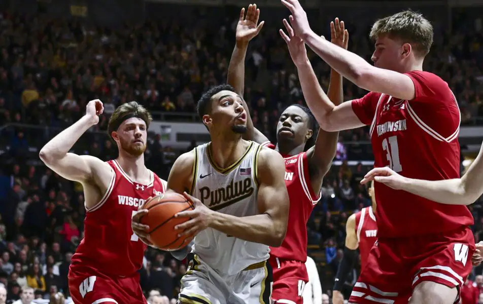 Week 17s AP Top-25 Poll Key Takeaways; SEC Talent Over Everything Plus Louisville's Sustained Success 1 Feb 15, 2025; West Lafayette, Indiana, USA; Purdue Boilermakers forward Trey Kaufman-Renn (4) is surrounded by Wisconsin Badgers under the basket during the second half at Mackey Arena. Mandatory Credit: Marc Lebryk-Imagn Images