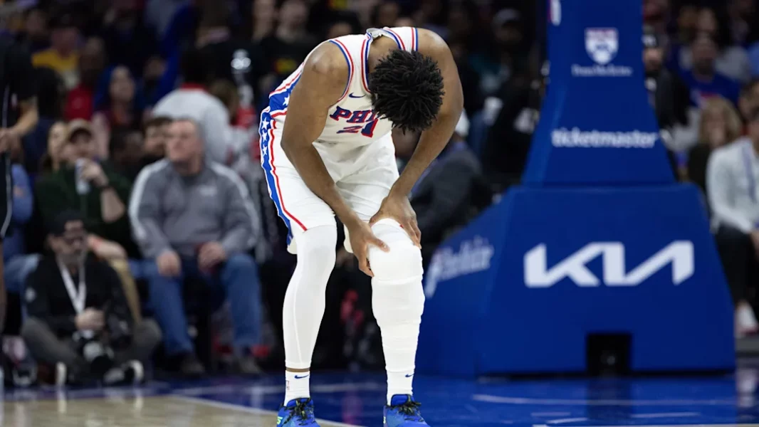 Bulls Dynasty Member Thinks Philadelphia 76ers Should Rebuild With All Player Issues - 'Paul George Is More into Podcasting' 3 Feb 22, 2025; Philadelphia, Pennsylvania, USA; Philadelphia 76ers center Joel Embiid (21) holds his leg after a play against the Brooklyn Nets during the second quarter at Wells Fargo Center. Mandatory Credit: Bill Streicher-Imagn Images / Bill Streicher-Imagn Images