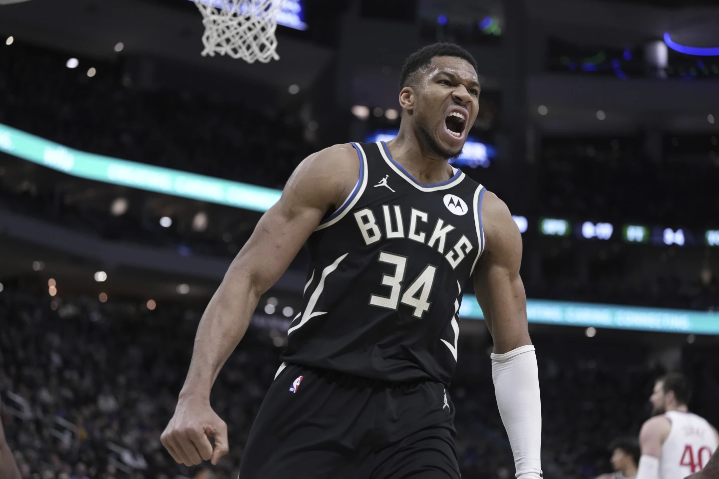 Milwaukee Bucks’ Giannis Antetokounmpo reacts during the first half of an NBA basketball game Thursday, Feb. 20, 2025, in Milwaukee. (AP Photo/Morry Gash)