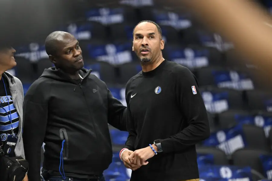 Dallas Mavericks general manager Nico Harrison (right) looks on during warms up before the game between the Dallas Mavericks and the Memphis Grizzlies at the American Airlines Center.