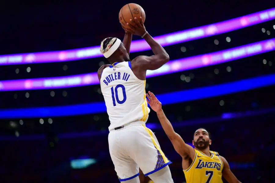 Golden State Warriors forward Jimmy Butler III (10) shoots against Los Angeles Lakers guard Gabe Vincent (7) during the second half at Crypto.com Arena.