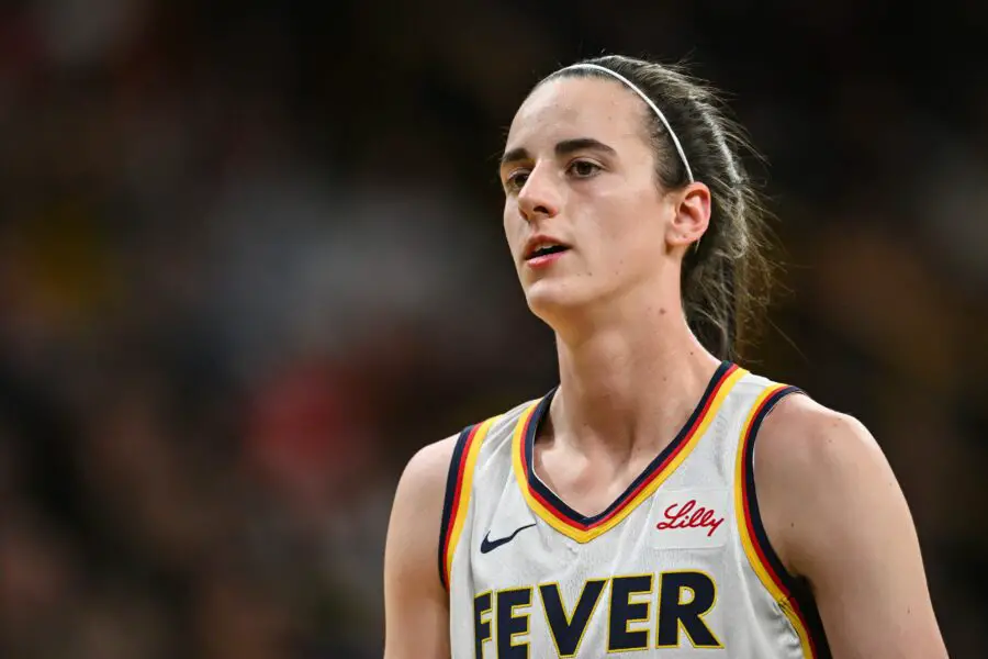 'I Got It': Caitlin Clark Offers To Pay Teammate's 'Hefty' WNBA Fine For Pushing Angel Reese 3 Indiana Fever guard Caitlin Clark (22) in action against the Brazil National Team at Carver-Haweye Arena.