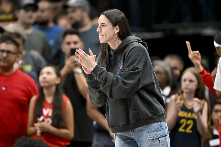“I Don’t Care What The League Did 10 Years Ago”: Caitlin Clark Nike Deal Ignites Debate After Dave Portnoy Blasts Nike Payout Against Devin Booker Jun 27, 2025; Dallas, Texas, USA; Indiana Fever guard Caitlin Clark (22) cheers for her team during the first quarter against the Dallas Wings at the American Airlines Center. Mandatory Credit: Jerome Miron-Imagn Images