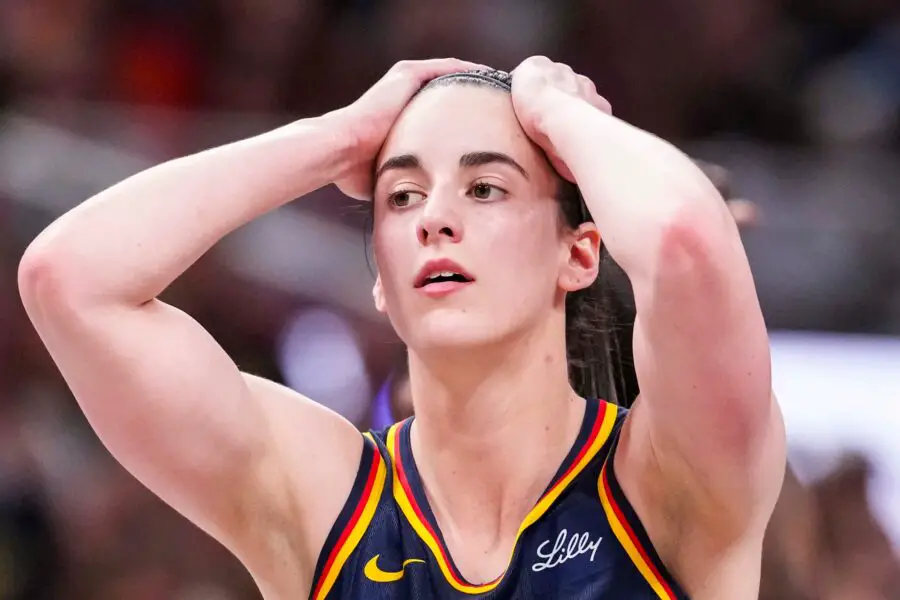 Indiana Fever guard Caitlin Clark (22) reacts to the action Tuesday, May 20, 2025, during a game between the Indiana Fever and the Atlanta Dream at Gainbridge Fieldhouse in Indianapolis. © Grace Smith/IndyStar / USA TODAY NETWORK via Imagn Images
