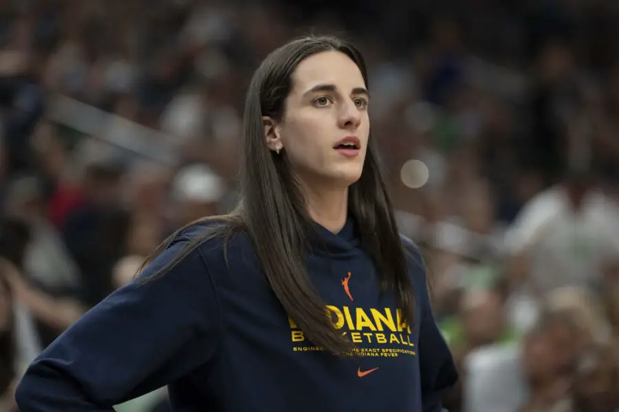 Jul 1, 2025; Minneapolis, Minnesota, USA; Indiana Fever guard Caitlin Clark (22) looks on against the Minnesota Lynx in the second half during the Commissioner's Cup final at Target Center. Mandatory Credit: Jesse Johnson-Imagn Images