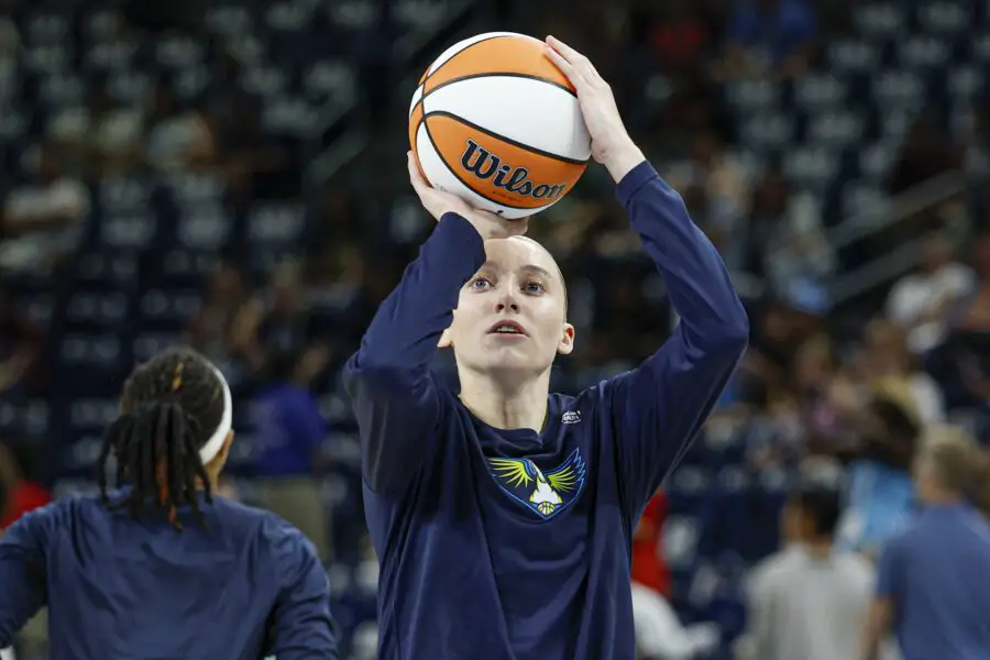 “Watching Paige Bueckers Talk Black While Angel Reese Tries Her Best To Talk White”: WNBA Fans Go Wild On Angel Reese, Paige Bueckers Hilarious Dialogue Jul 9, 2025; Chicago, Illinois, USA; Dallas Wings guard Paige Bueckers (5) warms up before a WNBA game against the Chicago Sky at Wintrust Arena. Mandatory Credit: Kamil Krzaczynski-Imagn Images