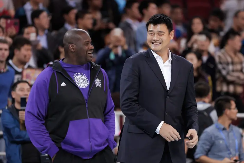 "These Two Dudes Look Like They Were Grown In A Lab": NBA Fans Drop Witty Comments As Yao Ming, Shaquille O'Neal Pose Picture With Jackie Chan, David Beckham Going Viral 1 NBA Fans reacts on Shaq's photo with Yao Ming