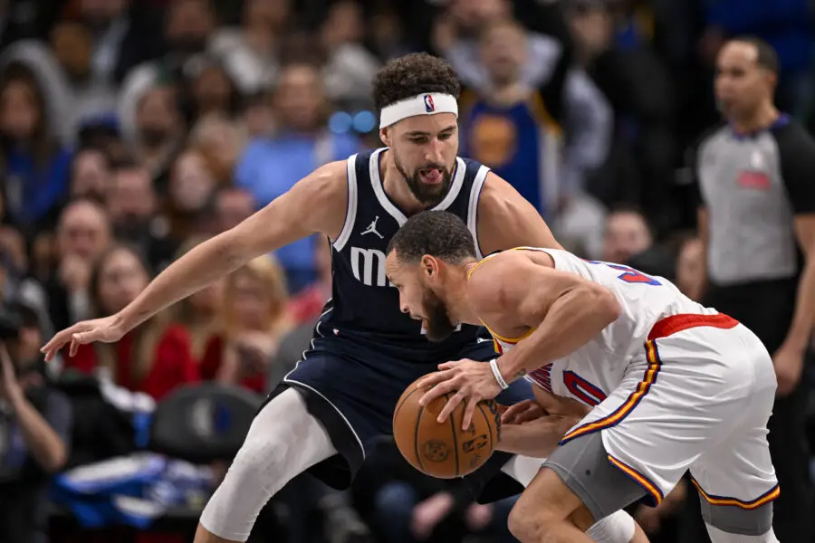 Feb 12, 2025; Dallas, Texas, USA; Dallas Mavericks guard Klay Thompson (31) and Golden State Warriors guard Stephen Curry (30) in action during the game between the Dallas Mavericks and the Golden State Warriors at the American Airlines Center. Mandatory Credit: Jerome Miron-Imagn Images