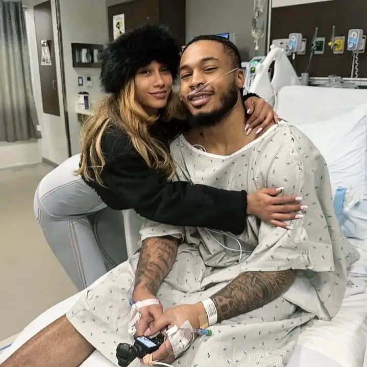 "She Should Babysit Him And Now Eating Him": NBA Fans Lose It After Cam Whitmore And BIA Crack Jokes About Their 13-Year Age Difference 1 Cam Whitmore shares a photo with BIA while he’s in the hospital. Photo credits: Facebook