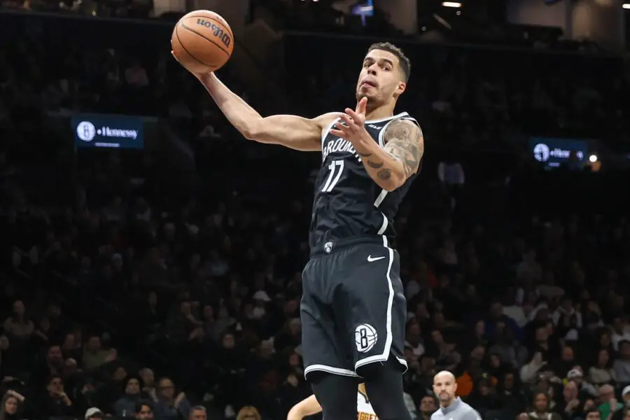 Jan 4, 2026; Brooklyn, New York, USA; Brooklyn Nets forward Michael Porter Jr. (17) grabs a rebound in the second quarter against the Denver Nuggets at Barclays Center. Mandatory Credit: Wendell Cruz-Imagn Images