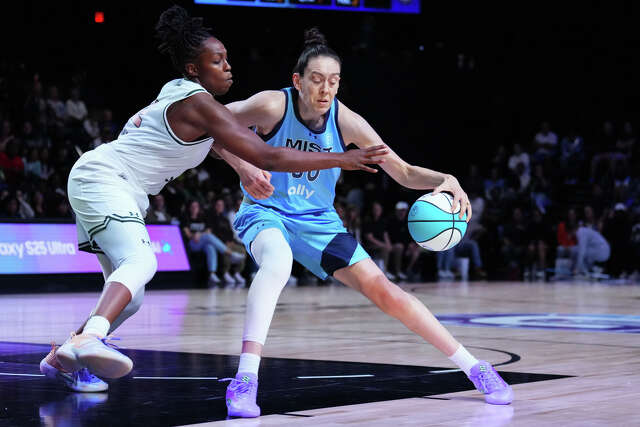 Brenna Stewart #30 of the Mist drives to the basket against Chelsea Gray #12 of Rose during the first quarter at Wayfair Arena on February 07, 2025 in Medley, Florida. (Photo by Rich Storry/Getty Images)Rich Storry/Getty Images