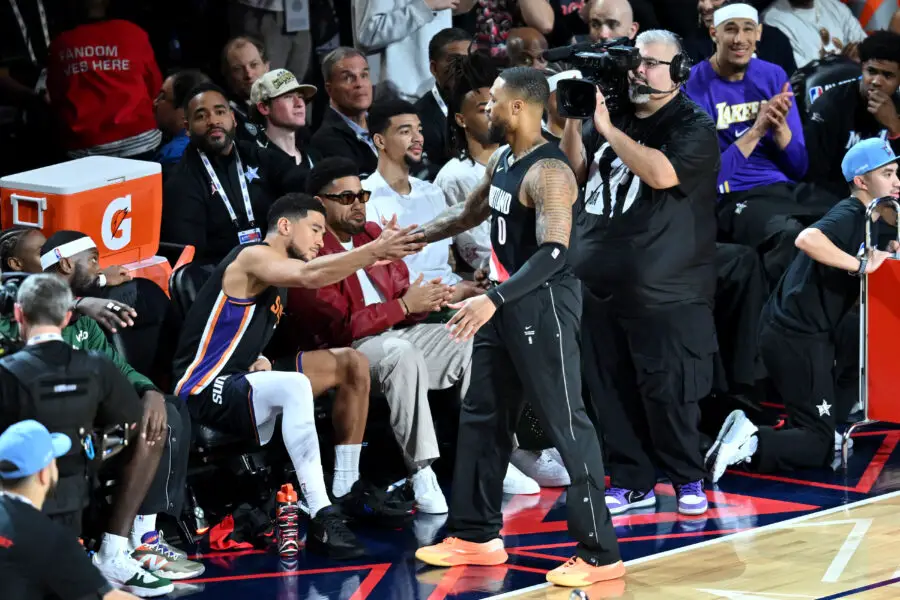 Portland Trailblazers star Damian Lillard daps Devin Booker after 3-point contest win